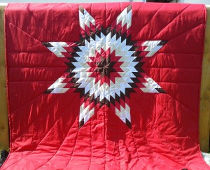 31. Red Blanket with Dark Brown, Red, Yellow and White Star