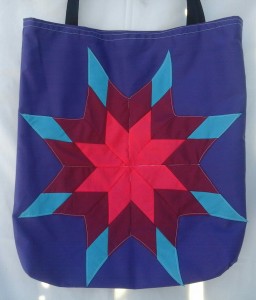 7. Purple bag with burgundy, dark pink and blue star.