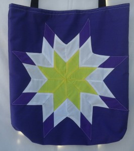 5. Purple bag with purple, yellow and white star.