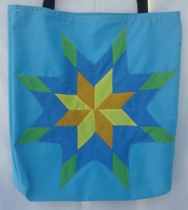 13. Blue bag with gold, yellow, blue and light green star.