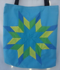 10. Blue bag with light blue, dark blue, yellow and green star.