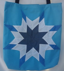 8. Blue bag with grey, white and blue star.