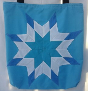 5. Blue bag with light blue, white and dark blue.