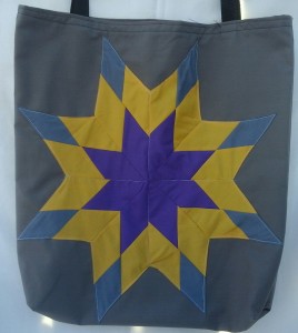7. Grey baq with white, blue, pink and grey star