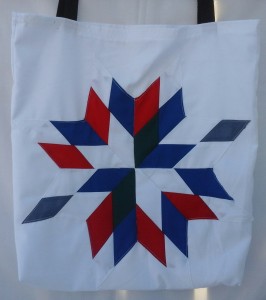 5. White bag with blue, grey, white, red,and black.