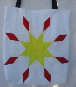 1. White Bag with yellow, white and red star