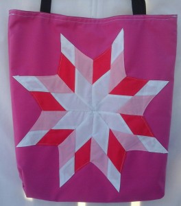 2. Pink bag with white, red, pink, and white star
