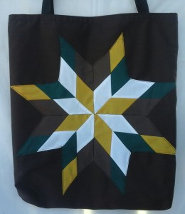 6. Brown Bag with Green, white, gold, and brown star