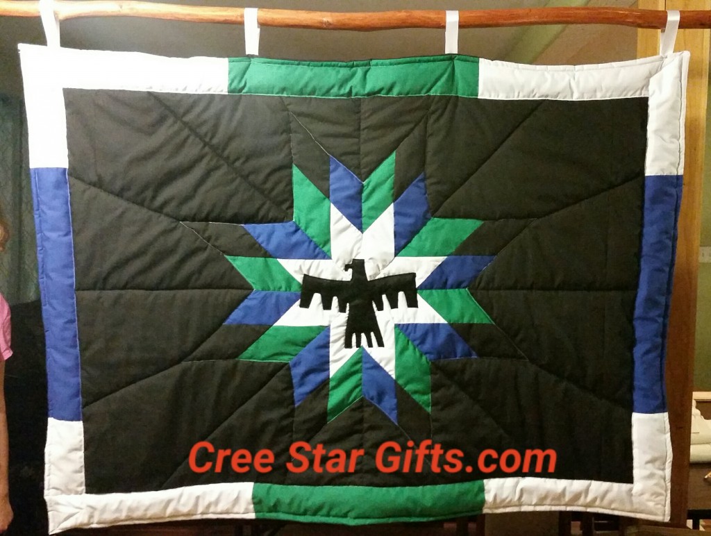 I just finished this blanket intended as a Wall Hanging. We used a Felt Material to create the Thunderbird, so it wouldn't fray. We also created the blanket using the client's traditional colors. I think it looks really good. We make it 56 by 42 inches....a Custom size for this client. I am happy it is done! REMEMBER we make Custom Star Blankets - ALL SIZES. www.creestargifts.com