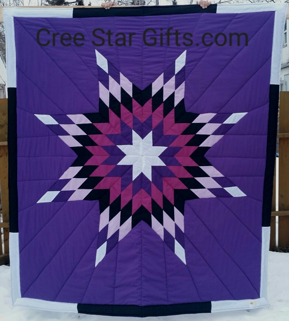 Royal Purple star blanket with white, light/dark purple, black, and eggplant purple star. The border is white and black.