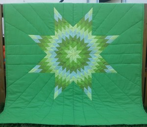 Green Blanket with Yellow, Light & Dark Green, and White Star.