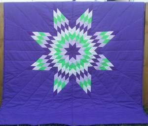 Purple Blanket with Dark & Light Purple, White and Green Star.