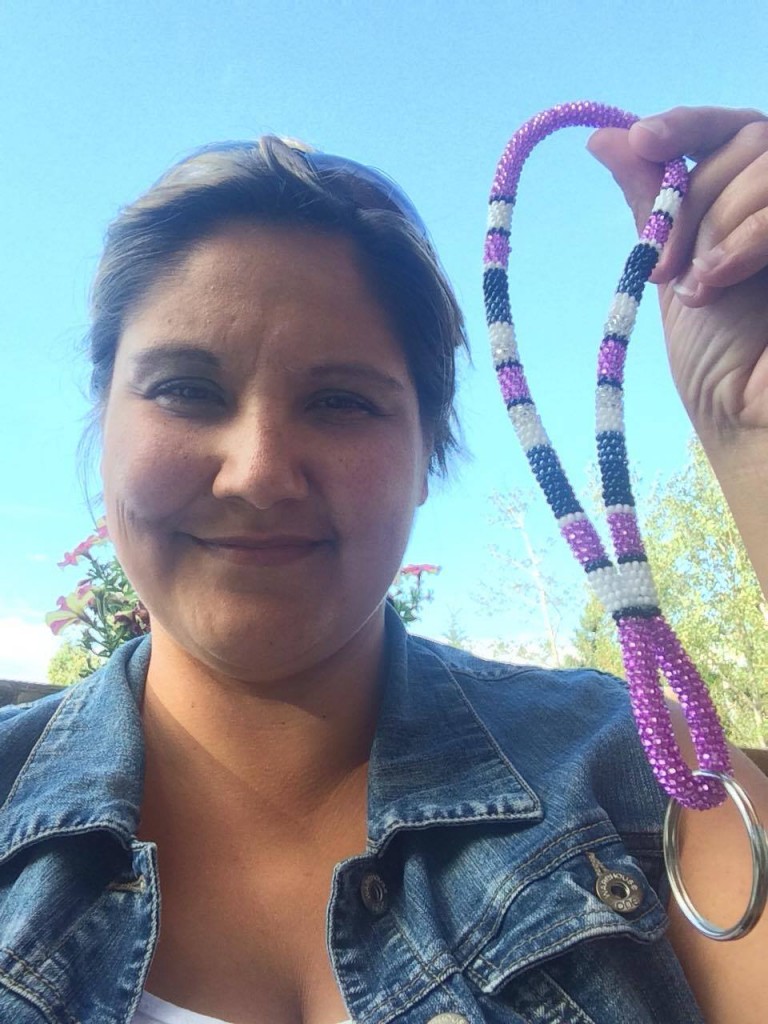 Michelle Williams is holding a Hand-Held Keychain purchased from Cree Star Gifts