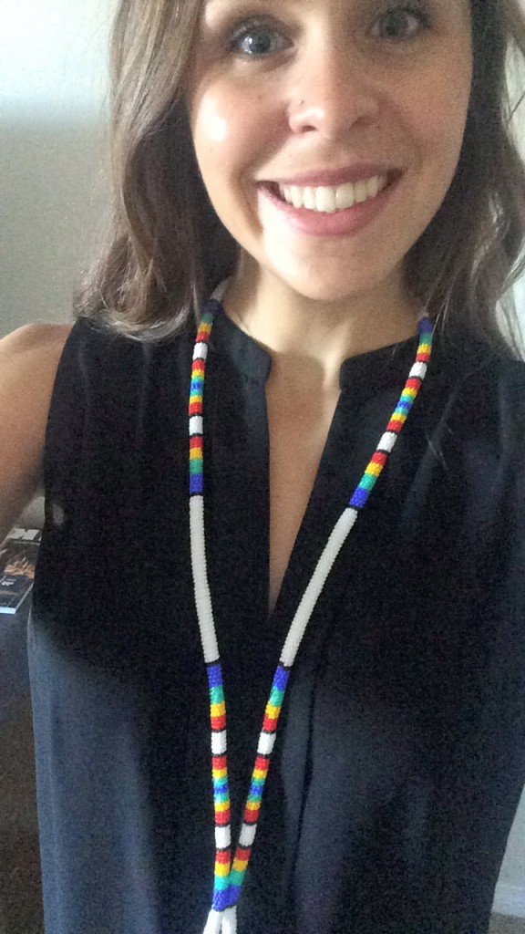 Agnes Flanagan from Edmonton Alberta with a beaded lanyard she purchased from us.