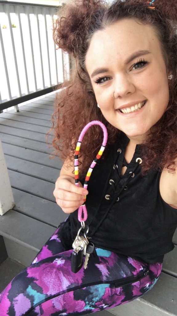 Taisja Chernenkoff with a Hand-Held Keychain purchased from us