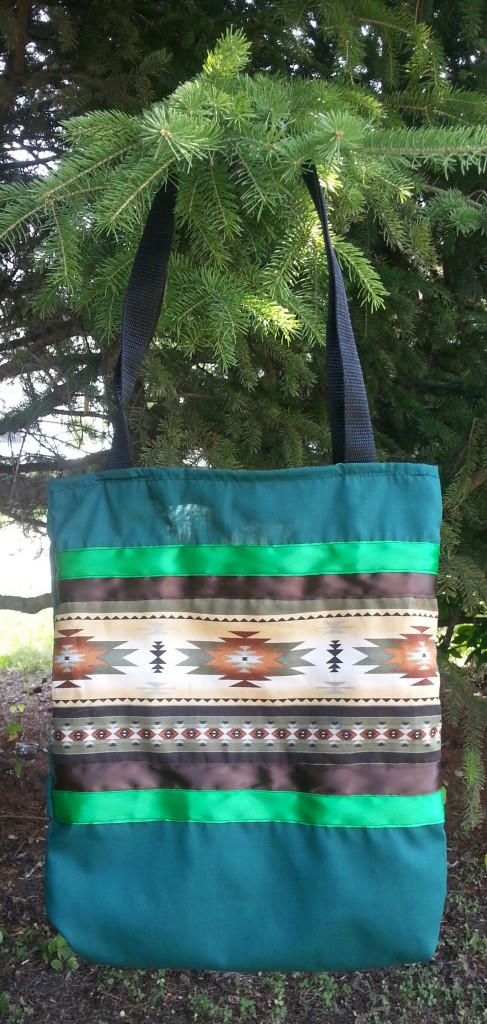 21. Green Bag with Brown/Green Ribbon and Print.