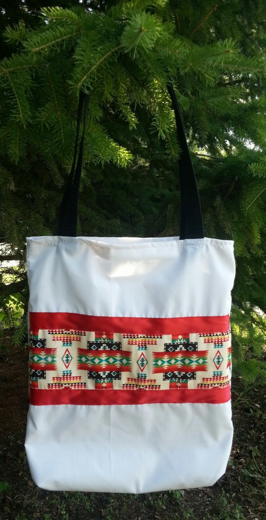 White Bag with Red Ribbon and Print.