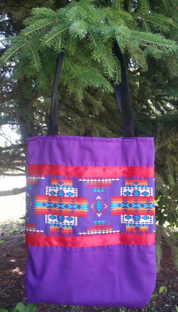 17. Purple Bag with print and red ribbon